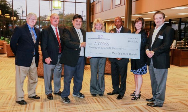 Housing nonprofit A-CROSS is awarded a $20,000 partnership grant. From left: U.S. Representative Joe Barton (TX-6); Ennis Mayor Russell Thomas; Jesse DeLeon, A-CROSS president; Stefanie McGrath,  executive director, A-CROSS; Bruce Hatton, vice president and Affordable Housing Program manager, FHLB Dallas; Julie Pierce, senior vice president and chief financial officer, Ennis State Bank; Bramlet Beard, president and CEO, Ennis State Bank.