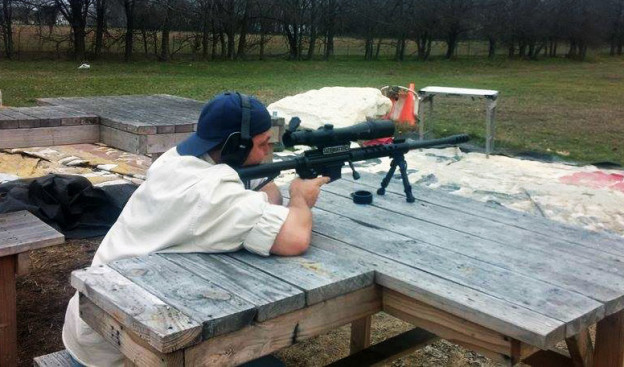 Red Oak resident and acting commander of the 3%ers Texas group, R.C. Lyon, shooting a 50 cal. rifle at private gun range in Waxahachie.