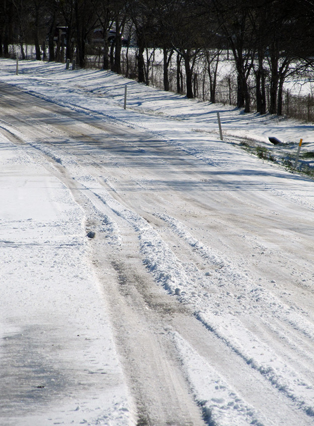 An Ellis County Farm-to-Market road still covered in snow and ice at around 11 a.m. on Thursday, March 5.