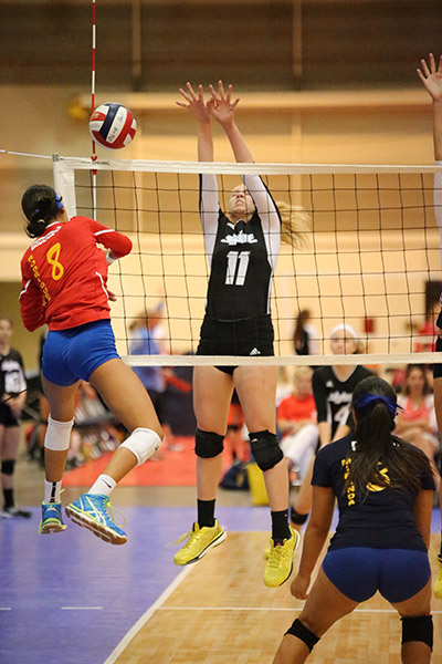 Waxahachie Indian varsity volleyball player Shelby Martin #11 playing on team Club Skyline during the USA Volleyball 2015 Girls Junior National Championship in New Orleans.