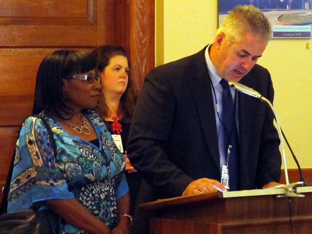 WISD veteran bus driver Artelia Thomas (left) was recognized during the Monday, June 8, 2015 school board meeting by Ryder Appleton (right) for quick decisions during a tornado warning on May 19.