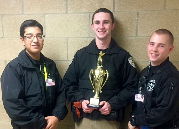 From left, Ellis County Sheriff Explorer Matthew Aguilar, Lt. Gage Adams and Sgt. Ross McRee.