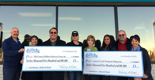 Shown at the recent check presentation are, from left, County Commissioner Pct. 3 Paul Perry, ECCAC board member Katherine Sirchia, ECCAC board member/treasurer Mike Navarro, Corner Store manager Laura Lamb, ECCAC supporter Beth Allen, ECCAC supporter Brisa Gray, Corner Store zone merchandiser and Country-Run committee chairman Ed Passalugl and Campfire Creek Therapeutic Riding Center founder/director Emily Oliver.